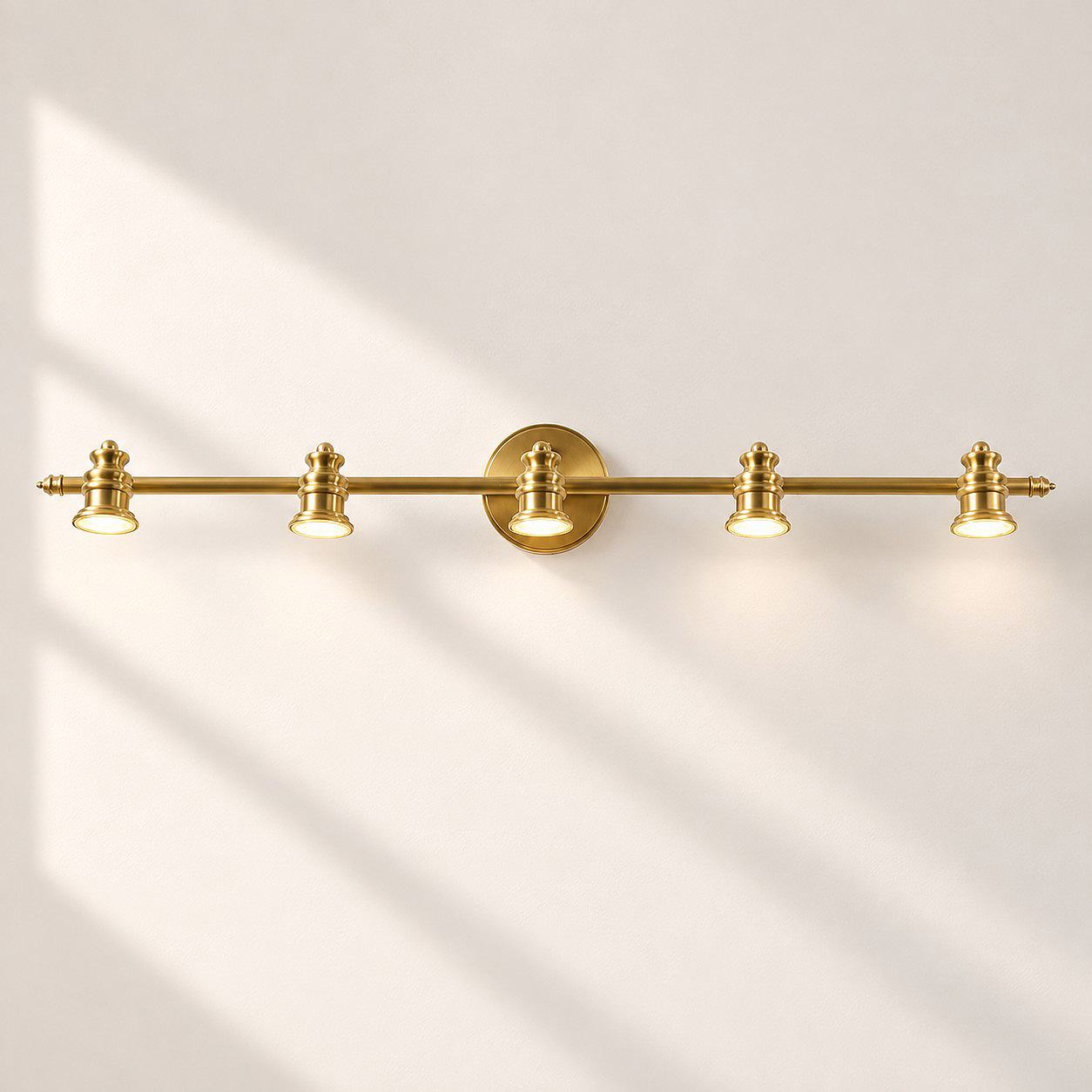 Aurelia Brass Vanity Wall Light with adjustable heads, one to five heads and individual aiming