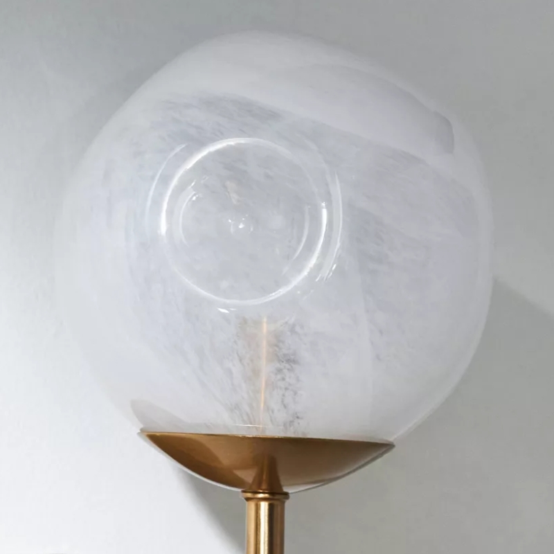 Close view of the sculpted glass shade