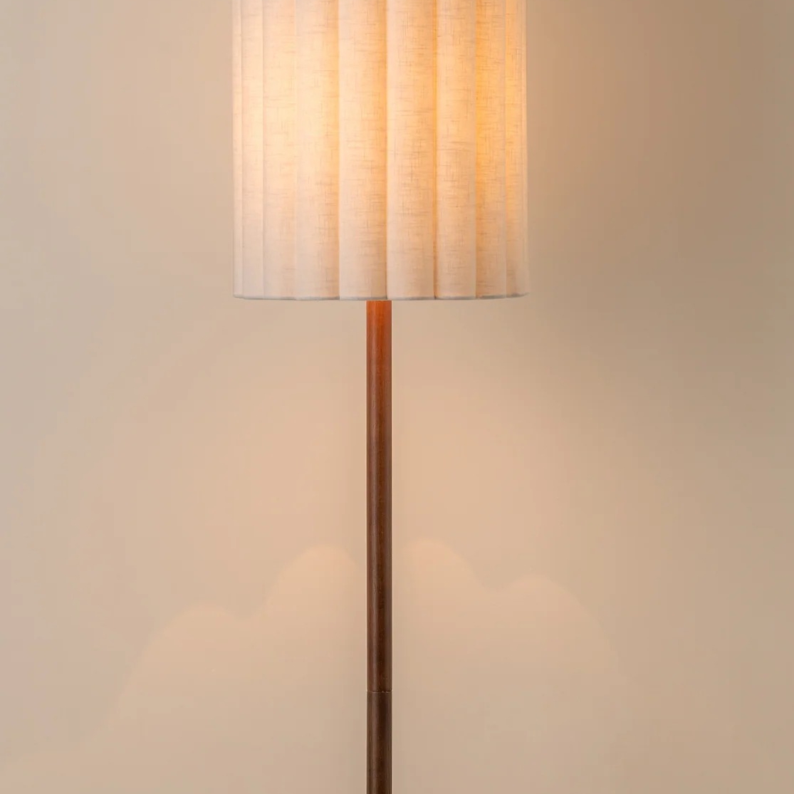 Warm glow through the textured linen shade