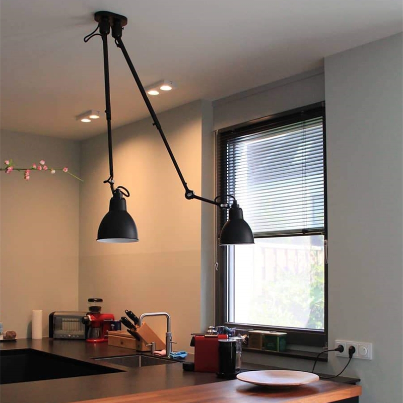 Industrial wall light over a kitchen counter