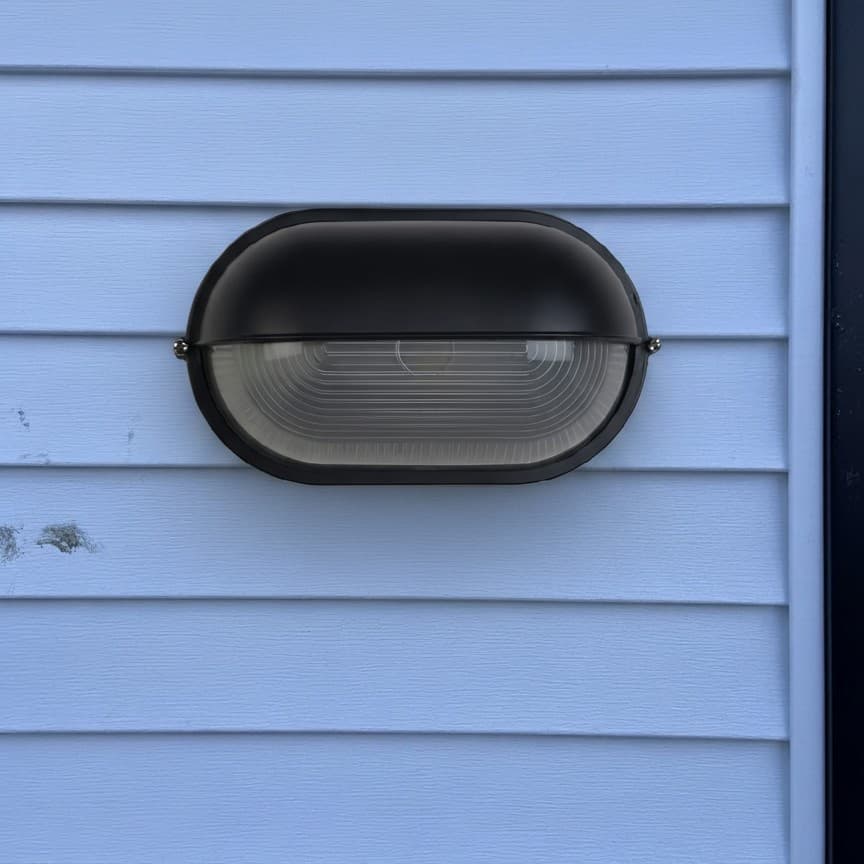 Customer installation of Docka black outdoor wall lamp