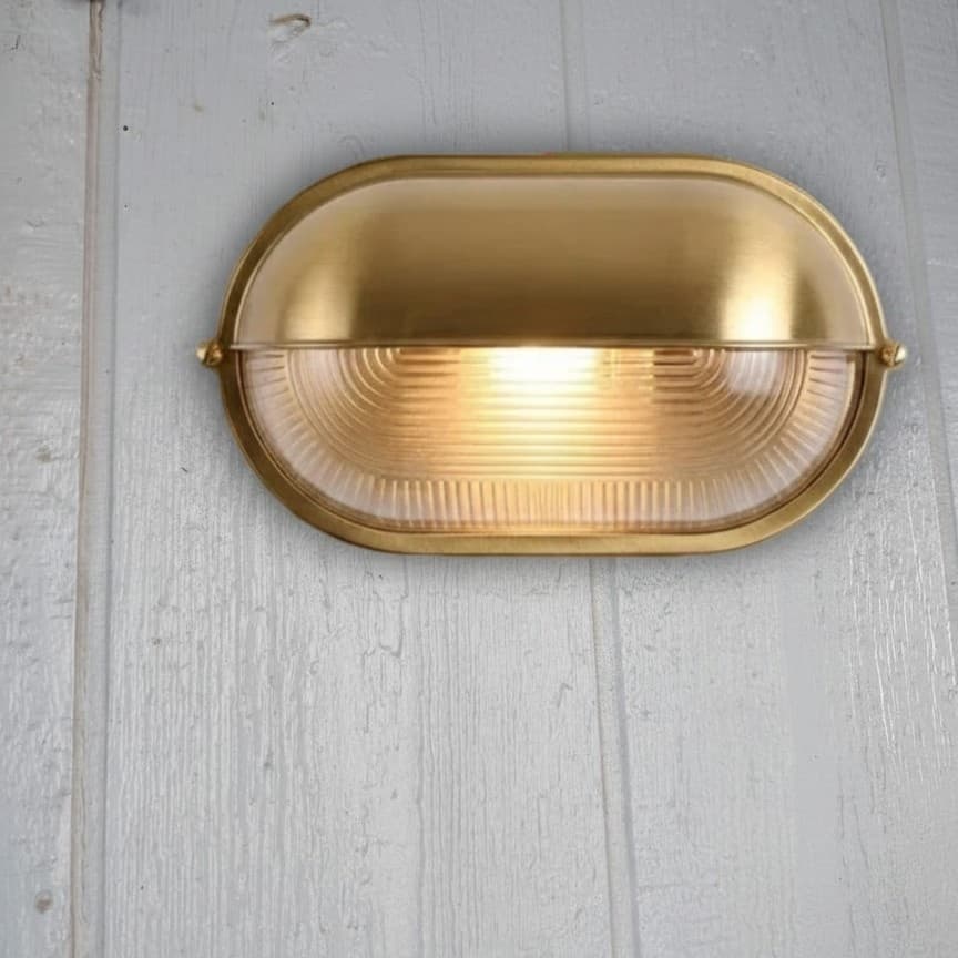 Customer installation of Docka gold outdoor wall lamp