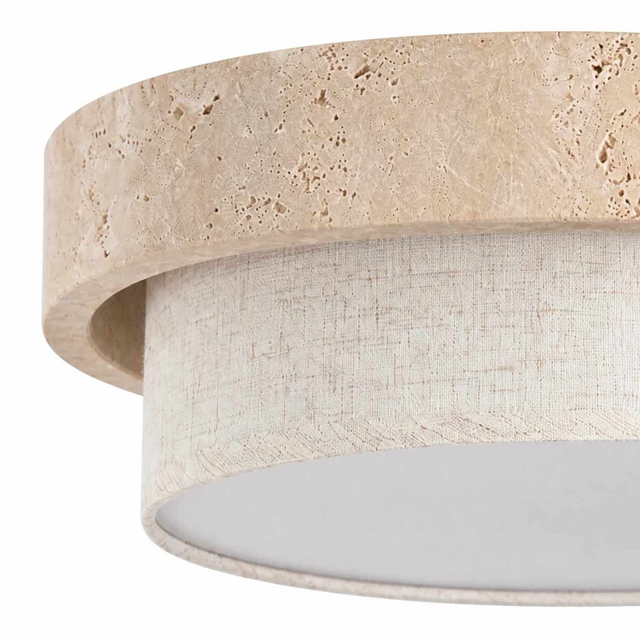 Close-up detail of travertine texture and fabric diffuser