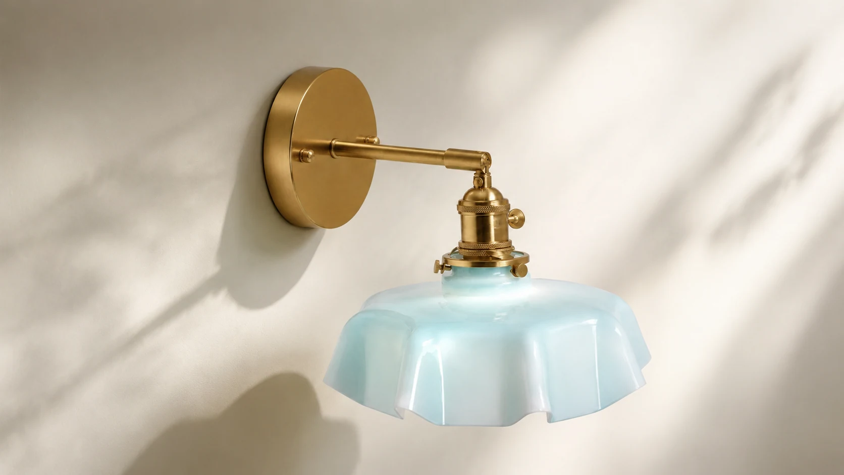 Blue Milk Glass Brass Wall Sconce in a warm room scene