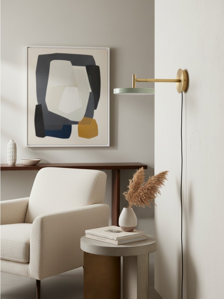 Asteria wall light beside artwork and seating