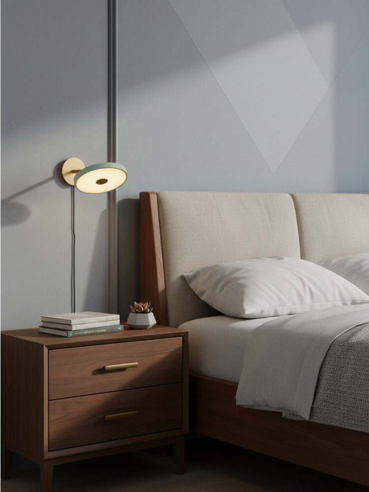 Asteria wall sconce over a bedroom nightstand