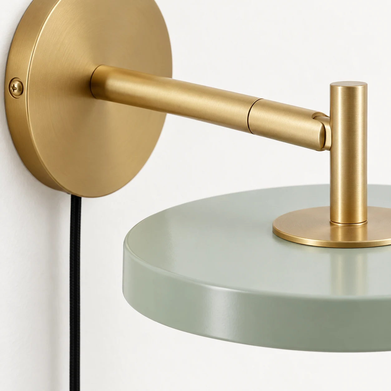 Close-up detail of the Asteria wall light shade and metal construction