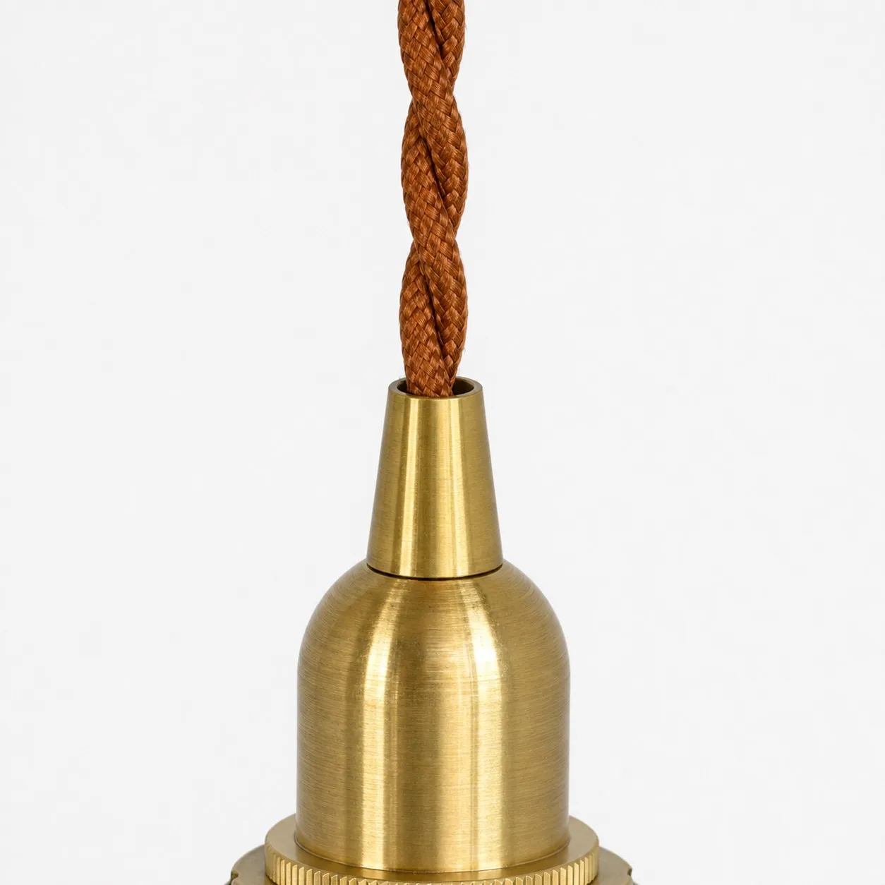 Braided cord and oxidized brass lamp holder detail