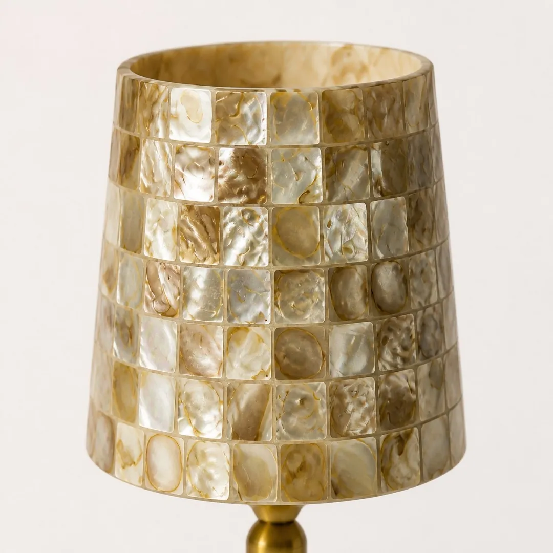 Close view of the pearlescent Capiz shell mosaic shade