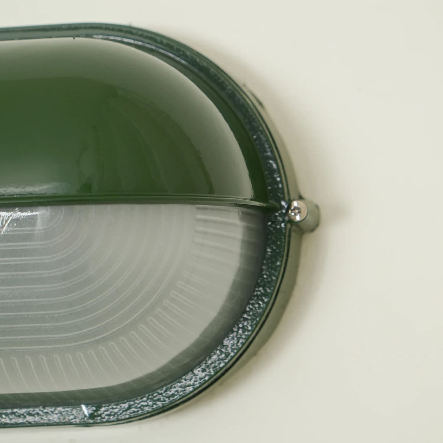 Close-up of Docka lamp glass and metal finish